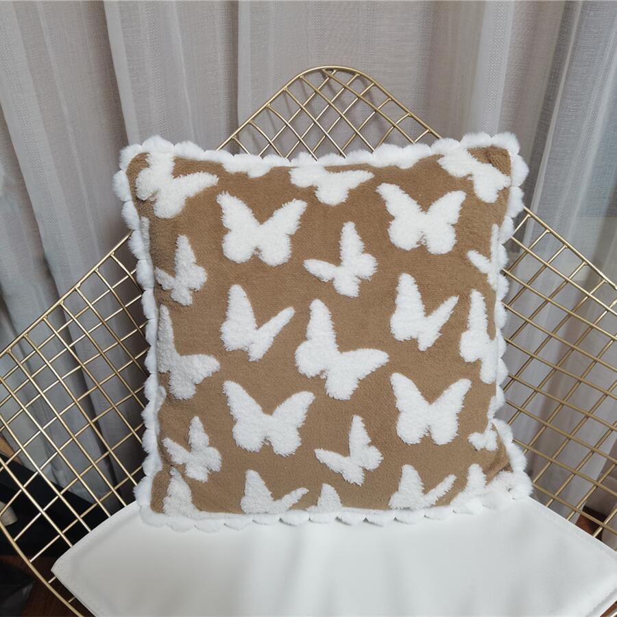 Plush cushion cover with butterfly pattern